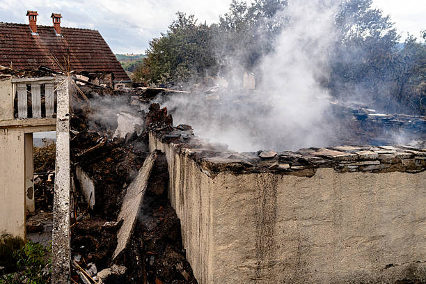 Professional Fire Damage Removal technician working in Dalbo, MN